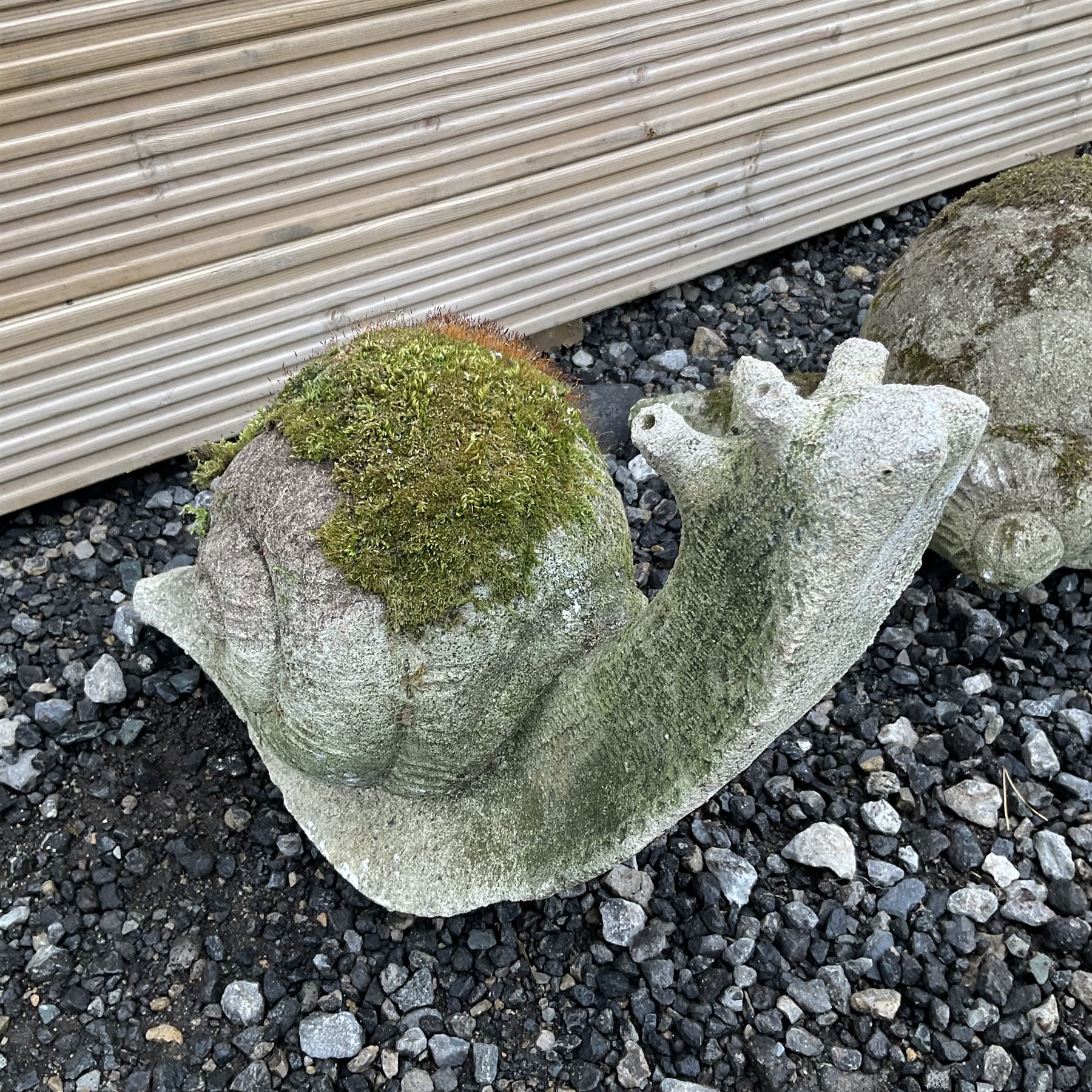 Two cast stone snail ornaments - THIS LOT IS TO BE COLLECTED BY APPOINTMENT FROM DUGGLEBY STORAGE, GREAT HILL, EASTFIELD, SCARBOROUGH, YO11 3TX