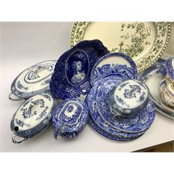 An early 19th century twin handled sucrier with cover, decorated with a seated female figure in a classical garden, together with 19th century teapot and sucrier, and further 19th century sucrier, plus a selection of blue and white, to include Spode teapot, four plates, and kidney shape dish, each with blue printed mark, a Willow pattern tureen and cover, etc. 