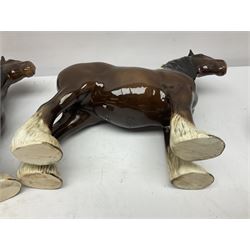 Four Beswick horse figures, comprising Quarter Horse, two Shires no 818 and matt palomino, together with Beswick donkey and Royal Doulton horse on a wooden plinth  