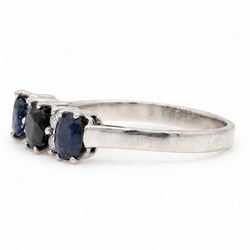 18ct white gold sapphire and diamond ring, three oval cut sapphires spaced by three round brilliant cut diamonds