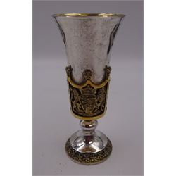 Modern limited edition silver Westminster Abbey Royal Wedding goblet, commemorating the marriage of HRH Prince Andrew and Miss Sarah Ferguson on the 23rd of July 1986, designed by Hector Miller for Aurum, the tapering cylindrical bowl with gilt interior and parcel gilt pierced band to base depicting the Royal Arms, upon knopped stem and circular stepped foot with floral parcel gilt rim, no. 483/750,  hallmarked Hector Miller, London 1986, H17cm