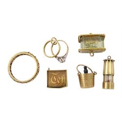 Five 9ct gold pendant/charms including fish tank, lantern, money box, wedding rings and champagne bucket and a 9ct gold stone set full eternity ring