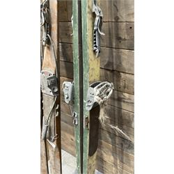 Two pairs of vintage skis, L207cm and 197cm