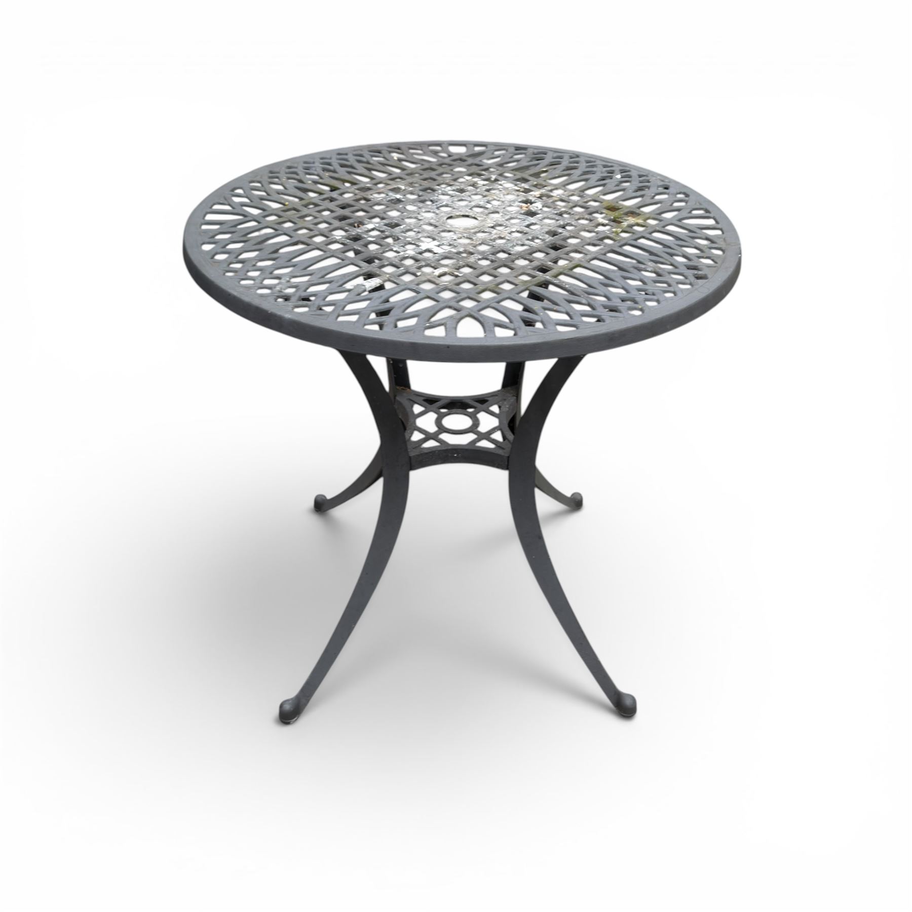Circular aluminium garden table and pair of armchairs chairs with a pierced and scrolling backs 