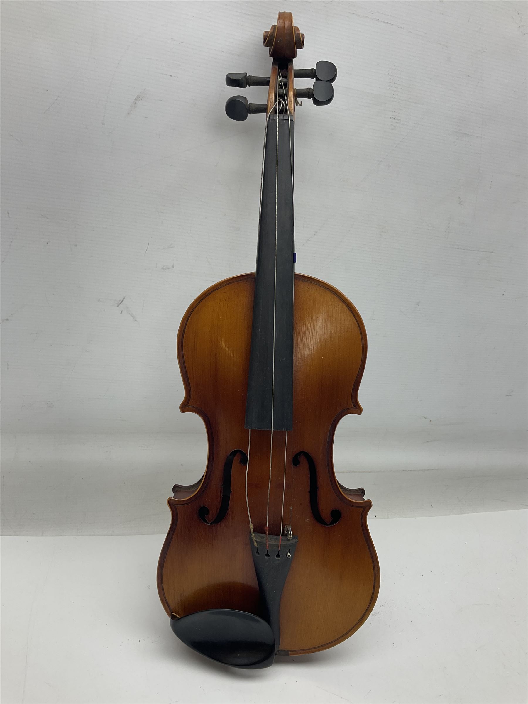 Saxony (?) violin c1950 with 36cm two-piece maple back and ribs and spruce top; bears label 'The Maidstone School Orchestra Association' L59cm overall; and 1950s Czechoslovakian violin for restoration; both in carrying cases (2)