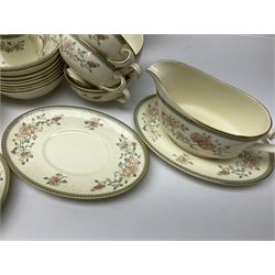 Minton Jasmine pattern tea and dinner wares, including dinner plates, sauce boats, side plates, bowls, teacups, coffee cans and twin handled soup bowls, etc (122)