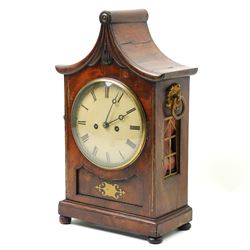 William IV mahogany and brass mounted bracket clock, the rectangular case with swept pagoda top with acanthus carved and rosette applied decoration, the sides with circular pierced brass fabric covered apertures and brass carrying handles, dial with 8 inch painted Roman chapters with pierced steel hands, the brass four pillar twin wire fusee 8-day movement with anchor escapement striking on a bell, lacking pendulum 