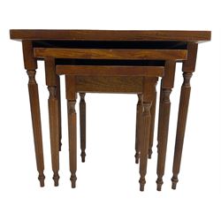 19th century design elm nest of three tables, rectangular shaped top, raised on tapering reeded supports 