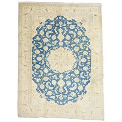 Central Persian Nain hand-knotted rug, sky blue field, with a central cusped medallion in ...