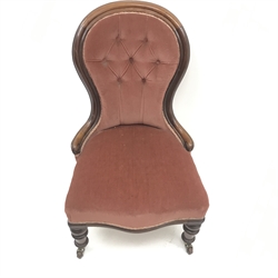  Victorian mahogany framed spoon back nursing chair, upholstered in deep buttoned fabric, turned supports, W57cm  