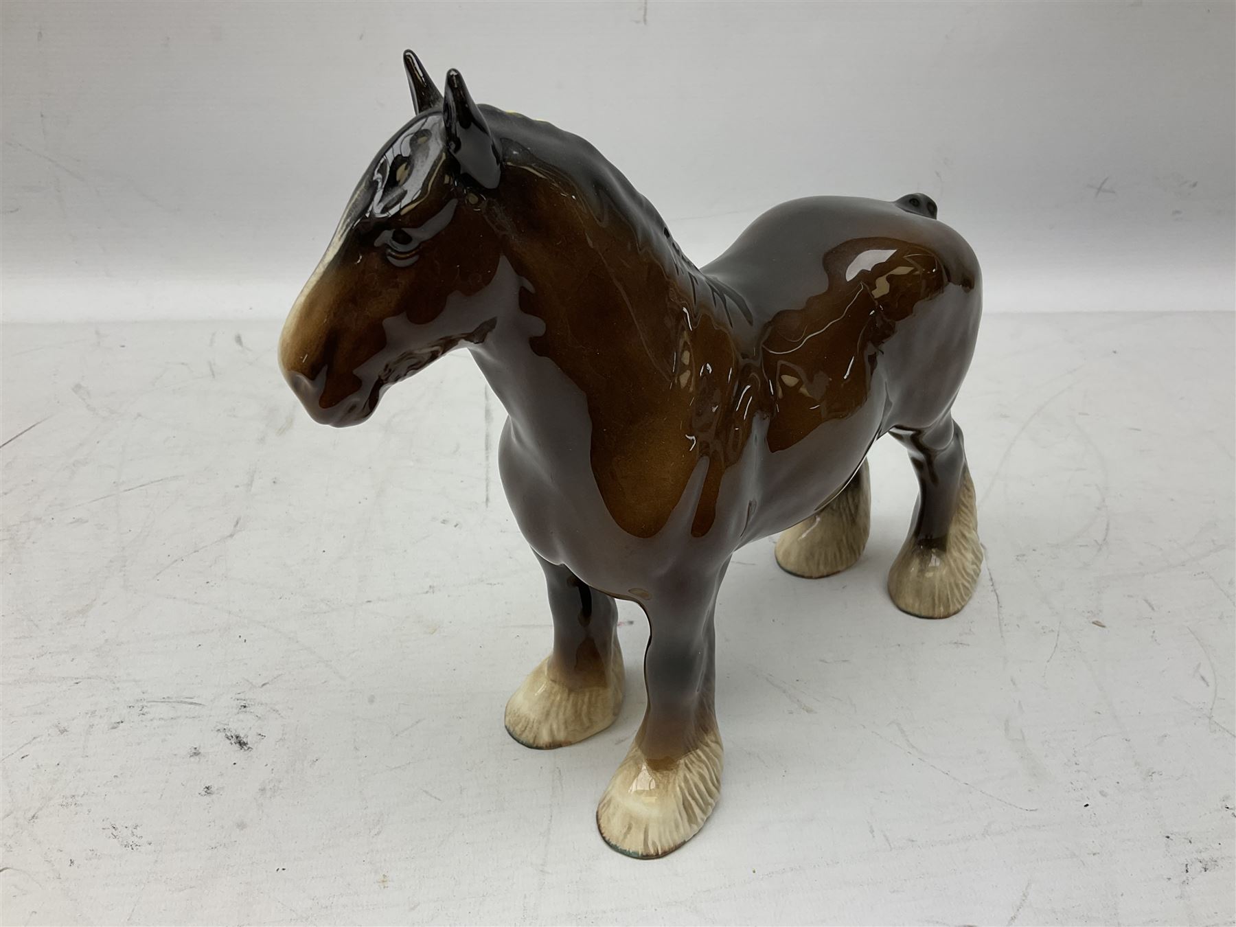 Six Beswick figures of bay horses, including large hunter no.1734, Shire horse no.818, horse with tucked head no.1549, etc (6)