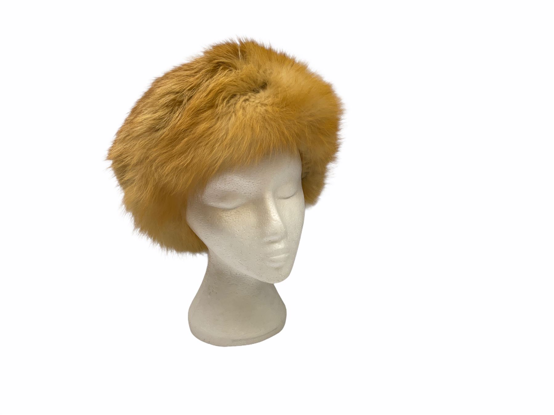 White Saga fox stole, together with Cresta Red fox fur hat, Red fox fur headband, a fur headband and matching cuffs, Harris Tweed clutch bag with fur trim, a fur clutch bag and an Ostrich feather and mohair scarf. 