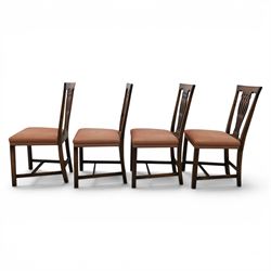 Set of eight George III dining chairs with padded seats, pierced vasiform splat, upholstered seat with brass trim, on square supports with H-stretcher