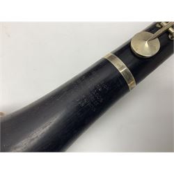 Early 20th century Hawkes and Son simple system hardwood clarinet serial no.1HM257102; cased; and a Swiss Maelzel BS Dulcet metronome of typical pyramid form (2)