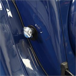 1939 MG SA Saloon

Registration: GRB 988
Chassis number: SA2983
Engine number: QPHG3242 (original engine)
Engine: 2,322cc six-cylinder petrol
Transmission: Manual
Odometer reading: 71,873 miles
Seating: Five
Colour: Two-tone blue
Former keepers: 6/7 recorded
V5C: Present
Keys: One

A 1939 MG SA Saloon, finished in an attractive two-tone blue colour scheme and retaining its original UK registration, GRB 988.

Introduced in 1936, the MG SA was the marque's prestigious sporting saloon, combining elegant coachwork with refined six-cylinder performance and luxurious accommodation. This example retains its original 2,322cc engine, numbered QPHG3242, and displays 71,873 miles on the odometer, although this mileage has not been independently verified.

The car is understood to have undergone an extensive rebuild and restoration between 2010 and 2015 and is today presented in showroom condition throughout. The coachwork has an excellent finish, complemented by outstanding chrome brightwork, wire wheels, a rear-mounted spare wheel, folding rear luggage rack and a desirable folding canvas sunroof. The engine bay is immaculately detailed, while the underside, chassis and suspension all reflect the high standard of restoration undertaken. A stainless-steel exhaust system has also been fitted.

The luxurious cabin features beautifully finished inlaid wood veneer, leather seating and period instrumentation, all presenting to an exceptionally high standard.

A particularly appealing aspect of this MG SA is its documented participation in the 1952 Daily Express National Motor Rally. Accompanying the vehicle are the original official rally programme together with period photographs showing the car competing in the event displaying entrant number 36. The programme lists entrant No. 36 in Class D.2 as an MG 2322cc, providing excellent documented provenance linking this car to one of Britain's best-known post-war motoring events, held between 12th and 15th November 1952.

Combining documented provenance with exceptional cosmetic presentation, this MG SA represents a rare opportunity to acquire one of MG's flagship pre-war sporting saloons.

At the time of cataloguing the vehicle started and ran well.

Features

• Original 2,322cc six-cylinder engine
• Manual transmission
• Original UK registration
• Two-tone blue coachwork
• Folding canvas sunroof
• Leather interior
• Inlaid wood veneer dashboard and trim
• Wire wheels
• Rear-mounted spare wheel
• Folding rear luggage rack
• Twin carburettors
• Stainless-steel exhaust system
• Extensive rebuild and restoration completed between 2010 and 2015

History and Documentation

• Approximately six to seven former keepers recorded
• Original engine (No. QPHG3242)
• Chassis No. SA2983
• Original UK registration
• Extensive rebuild and restoration completed between 2010 and 2015
• Original 1952 Daily Express National Motor Rally programme
• Period photographs showing the vehicle competing as Entrant No. 36
• V5C registration document not present
• One key

Condition

Presented in exceptional showroom condition, this MG SA has clearly benefited from a high-quality restoration completed to an impressive standard. The paintwork, chrome, interior, engine compartment and underside are all exceptionally well presented, reflecting the considerable work undertaken.

The vehicle started and ran well at the time of cataloguing. It has not been subjected to a full mechanical inspection by the auctioneers, and prospective purchasers should satisfy themselves as to the vehicle's condition, originality, mileage, specification and roadworthiness prior to bidding.

This vehicle forms part of the Estate of the late John Sills and is offered for sale by the Executors, providing a genuine reason for sale.
