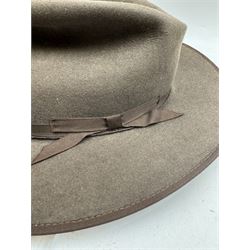 Akubra pure fur felt trilby hat, together with another trilby and two top hats, one by Woodrow and one by Dunn & Co