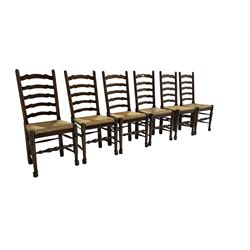 Late 20th century set six ladder back dining chairs, with rush seats