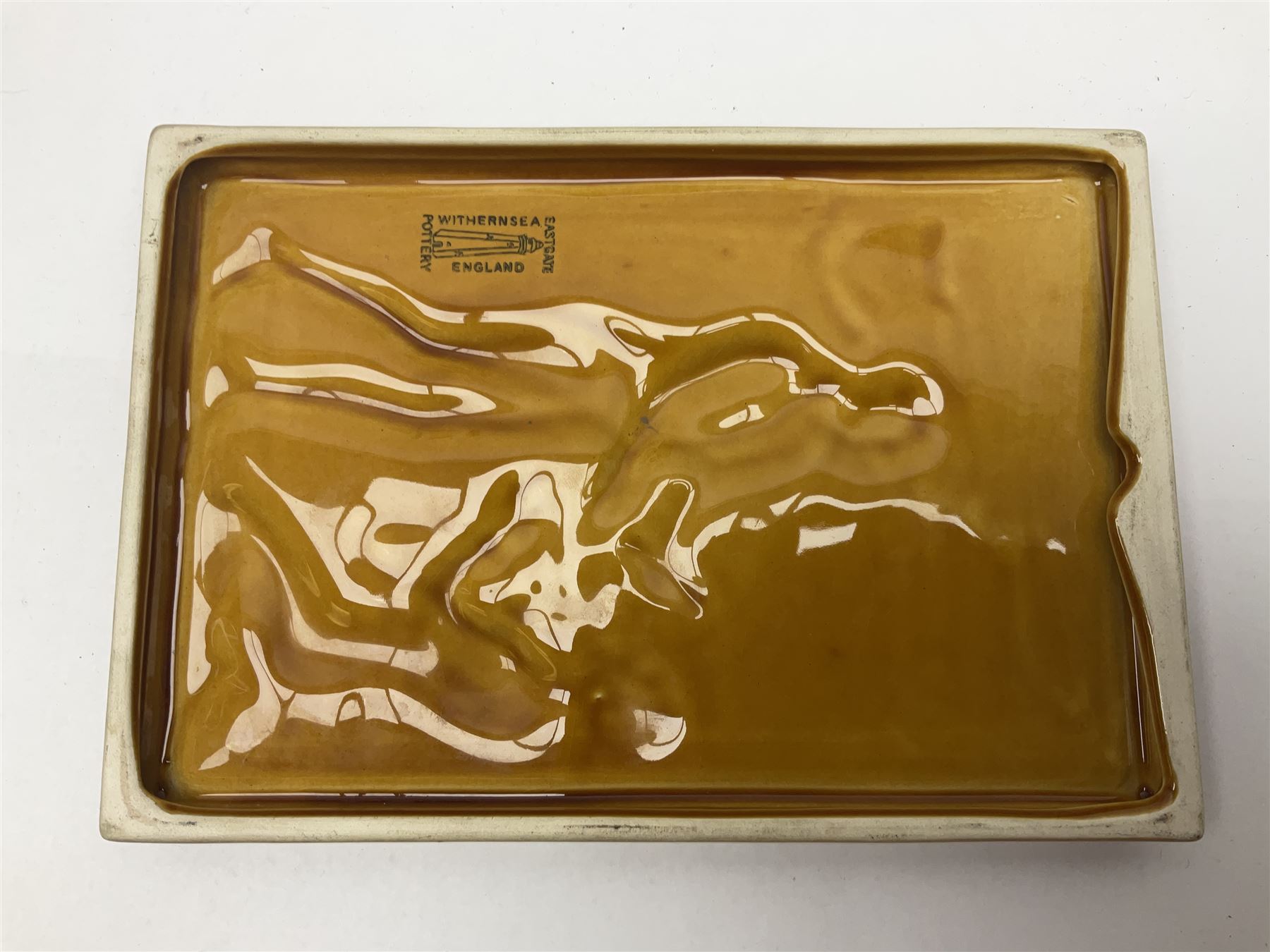 Group of William Wilberforce Abolition of Slavery items, comprising Wedgwood black on cane Jasperware pin tray, Wedgwood light blue Jasperware plate, and two Wedgwood oval medallion pendants, each depicting a kneeling figure beneath the inscription 'AM I NOT A MAN AND A BROTHER?', an Eastgate pottery plaque decorated in relief with a kneeling figure before William Wilberforce, a Hull Museum Publications pamphlet titled 'Medals, Tokens, etc., Issued in Connection with William Wilberforce and the Abolition of Slavery', by Thomas Sheppard, dated 1916, and an antique print depicting William Wilberforce after the original portrait by George Richmond, (7)