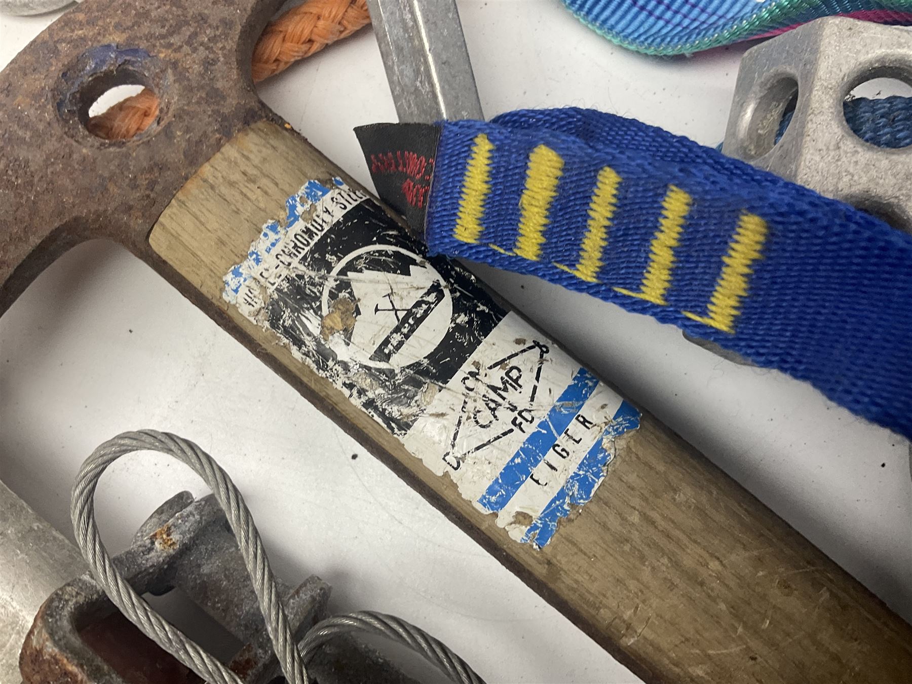 Collection of 1960s/70s climbing equipment including two original Hamish McInnes Pterodactyl ice axes, Joe Brown helmet, carabiners, ropes and wires etc