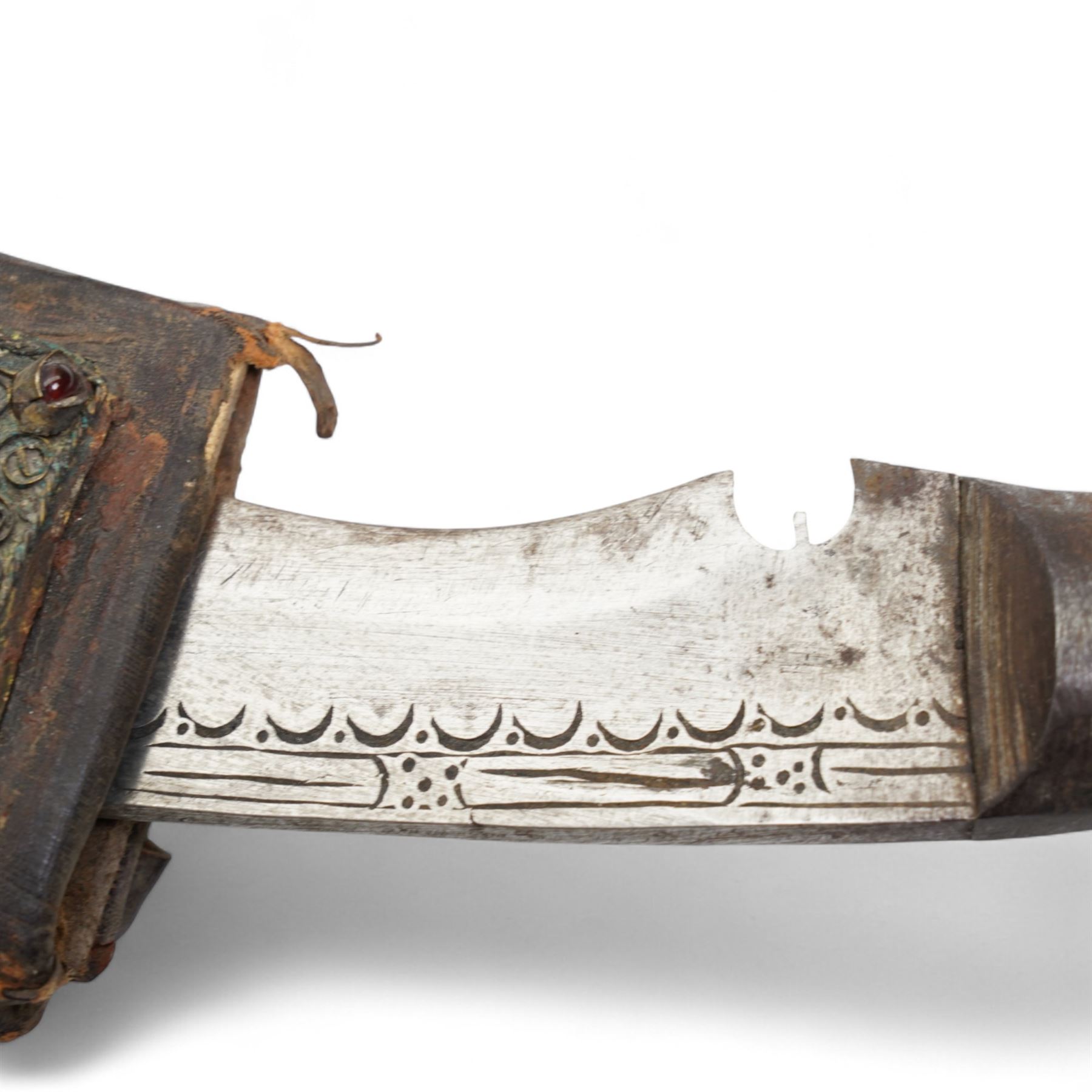 Gurkha Kukri with horn handle and jewelled scabbard, two other Kukris, Arab jambiya Finnish sporting knife with birch handle by Martiini Rovaniemi and German made WWI sword probably for the Turkish market