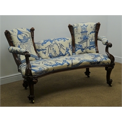  William IV double ended mahogany framed curved settee, upholstered in Sanderson Pagoda River fabric, foliate carved cabriole legs with brass castors, W150cm, H87cm, D70cm  
