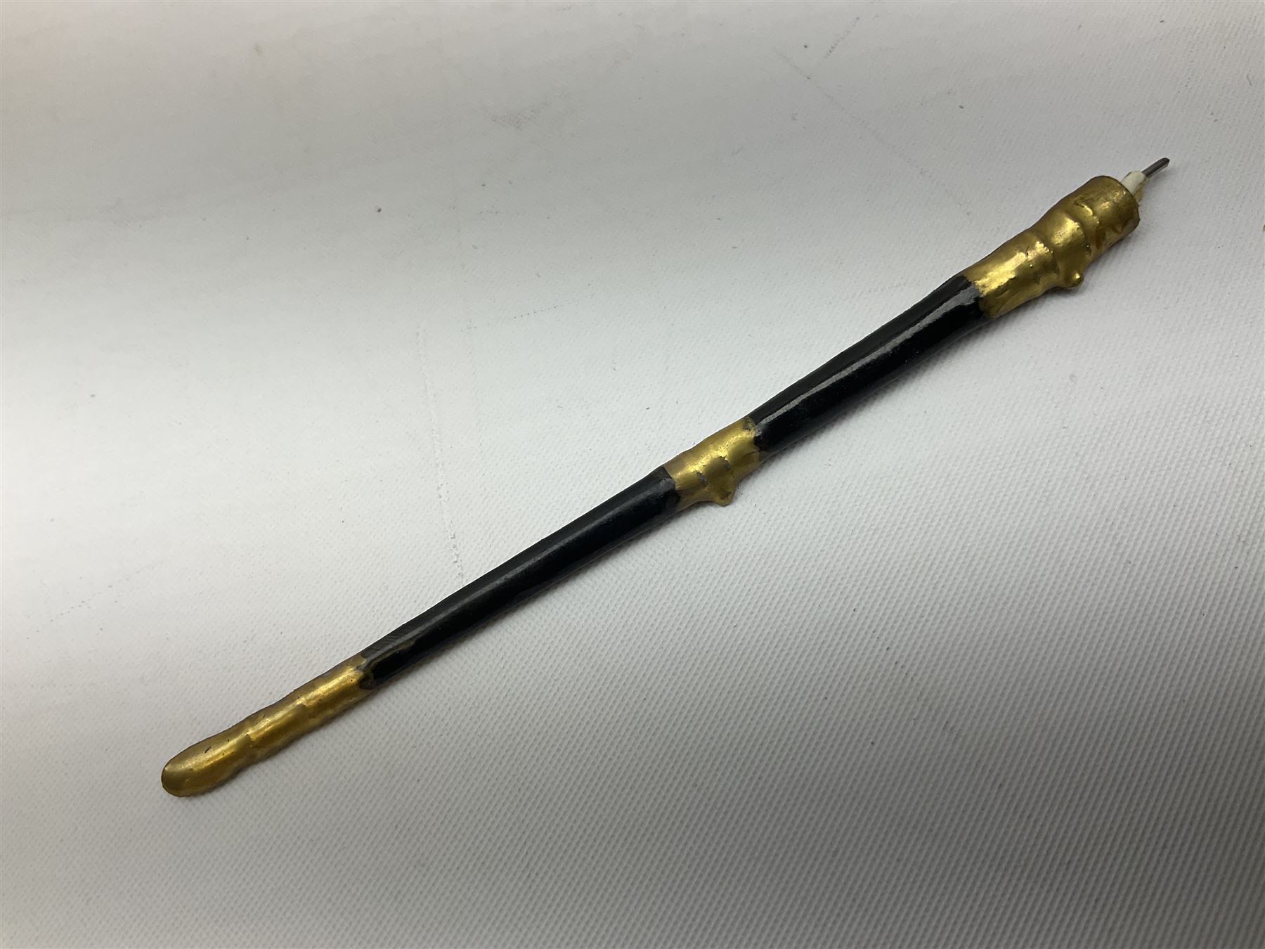 Sitzendorf figure, The Black Watch officer, c1815 standing to attention in full dress with sword, blue factory marks beneath, H28cm