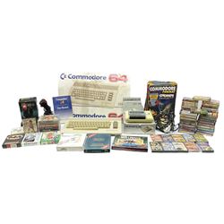Commodore 64 games computer with boxed 1530 Datassette Unit Model C2N, two joysticks, over seventy games and twenty-two Commodore magazines; polystyrene box inner and card slip-case