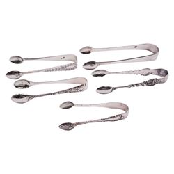 Five pairs of silver sugar tongs, comprising Edwardian pair with harp, shamrock, and serpent modelled arms, hallmarked John Round & Son Ltd, Sheffield 1909, George IV pair, hallmarked London 1823, makers mark indistinct, a Victorian pair with foliate engraved decoration, hallmarked Wakely & Wheeler, London 1885, a further Victorian pair, and an Edwardian pair, approximate total weight 4.26 ozt (132.4 grams)