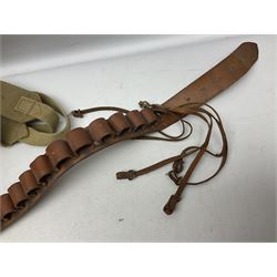 Mundial Brazil bowie knife, the 15.5cm steel blade inscribed 'Sheriff Knife', with banded and aluminium hilt; in leather sheath L29cm overall; British Army felt covered metal water bottle with webbing strap; leather 12-bore cartridge belt; and small pair of non-military binoculars in part case (4)