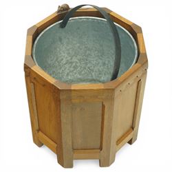 Mouseman - octagonal oak planter or log bin, with contrasting fumed oak panels, penny moulded top, with a cylindrical removable steel bucket, on eight short legs, with carved mouse signature, by the workshop of Robert Thompson of Kilburn, with 1997 original purchase receipt