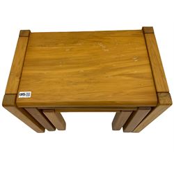 Rectangular pine coffee table, plank top; and matching meat of three tables