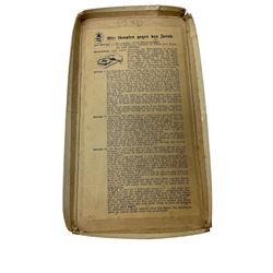 WWII German board game, Wir Kampfen gegen den Feind, Goebel Spiele, 1940, color-printed, foldable game board: British Isles with concentric distance circles, 3 rotating discs, fifteen game pieces (comprising three submarines, seven bombers and five fighter planes), in original box
