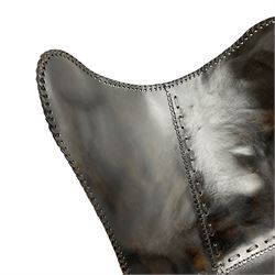 Stitched leather butterfly chair, on metal base