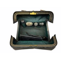 Vanity case, with dark green satin lining and cut glass silver topped dressing table jars, together with wooden writing slope and a carved wooden letter holder. 