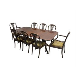 Georgian design mahogany dining table, rectangular moulded top with rounded corners, turned pedestal on moulded splayed supports with brass cups and castors, with additional leaf (W202cm, H73cm, D107cm); together with eight Edwardian mahogany dining chairs, arched cresting rail over pierced splat back, upholstered drop in seats