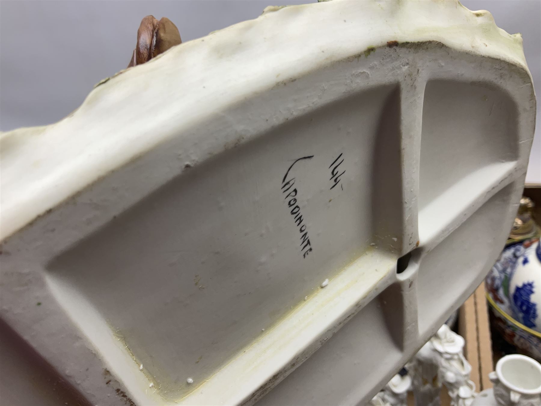 Collection of ceramics to include Royal Doulton Winston Churchill toby jug, Capodimonte style figures, novelty brandy decanter etc, in two boxes