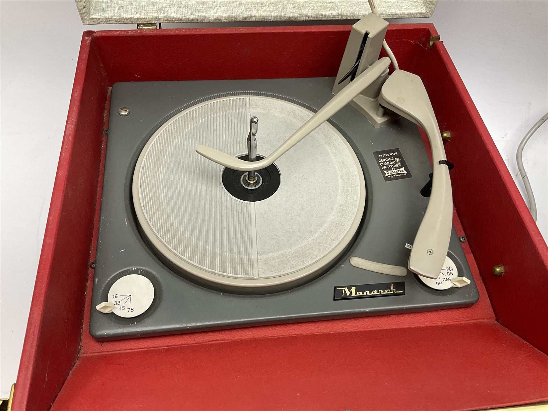 Dansette portable record player with Monarch turntable, together with a