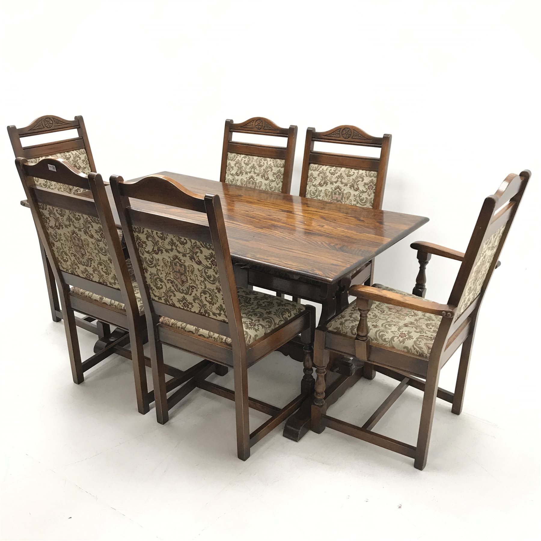 Old Charm - refectory style rectangular oak dining table, shaped and pierced end supports joined by stretcher on sledge feet (W153cm, H76cm, D82cm) and set six (4+2) oak framed dining chairs, carved and shaped cresting rail, upholstered splat and seat, baluster supports (W58cm)