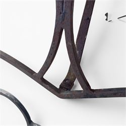 Cast iron garden table, with rectangular weathered slatted wooden top, raised on iron strapwork supports of scrolling form, in black painted antique finish 