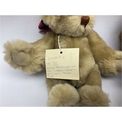 Group of five teddy bears comprising ‘George’ a unique pellet filled bear with glass eyes and velvet paws H38cm, and ‘Abbey’ a luxury German plush with wobble head and glass eyes no.5/10 H24cm, both with Teddies from Bearyland labels; along with two light blonde mohair H. M. Bears and Boyds Bears ‘T. F. Wuzzies’ no. 595140 (5)