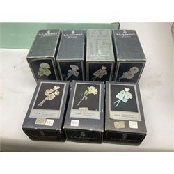 Seven Lladro flowers, comprising Japanese Camelia on base no 5181, Yellow Begonia on base no 5186, Miniature Begonia on base no 5188, Chrysanthemum on base no 5189, California Poppy no 5190.B, Miniature Begonia 5188.B and White Carnation no 5184.B, together with Lladro Spanish Joining pack with 17616 Winter Bell, Additional Lladro parasols and flowers etc 