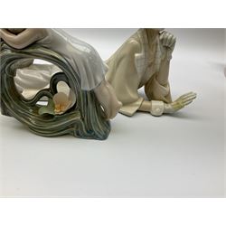 Collection of seven Lladro figures, including Seated ballerina with swan 6204, Childhood Dream 8129, Dancer 5050, reclining clown with ball alongside a selection of other figures. 