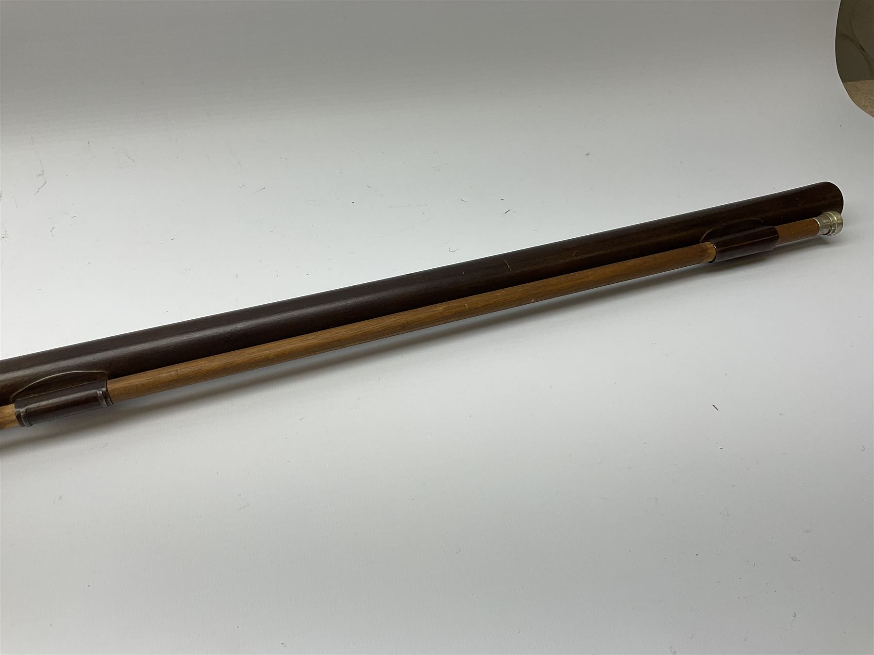 Early 19th century 15-bore flintlock converted to percussion cap fowling piece, the lock stamped T. Richards, walnut half stock with brass fittings including trigger guard with pineapple finial and 91cm barrel with ramrod under L129cm overall