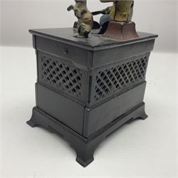 American 'Organ Bank' musical cast-iron mechanical money bank with hand cranked action and seated figure with two dancing dogs on top; locking door to base (no key); marked to the back 'Pat June 13 1882', H19cm