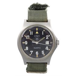 CWC Quartz British Military Army issue stainless steel gentleman's wristwatch, black enamel dial, with broad arrow, circled 'T' for Tritium and date aperture, back case stamped W10/6645-99 5415317 31362 84, on fabric strap