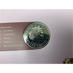 Ten Queen Elizabeth II United Kingdom five pound coins, including 2000 etc, all in card folders