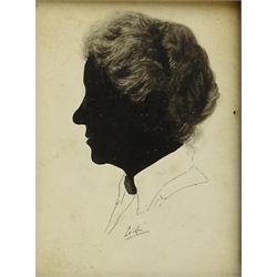  Silhouette Portrait of Gentleman, oval 19th century painted on paper 8.5cm x 7cm and Portrait of a Lady, silhouette signed Leigh 12.5cm x 9cm (2)  