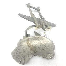  Metal model of an twin prop aeroplane inscribed 'Australia, South Pacific, 1946' mounted on an ashtray in the shape of Australia and inscribed with towns cities, W19cm, H13cm   
