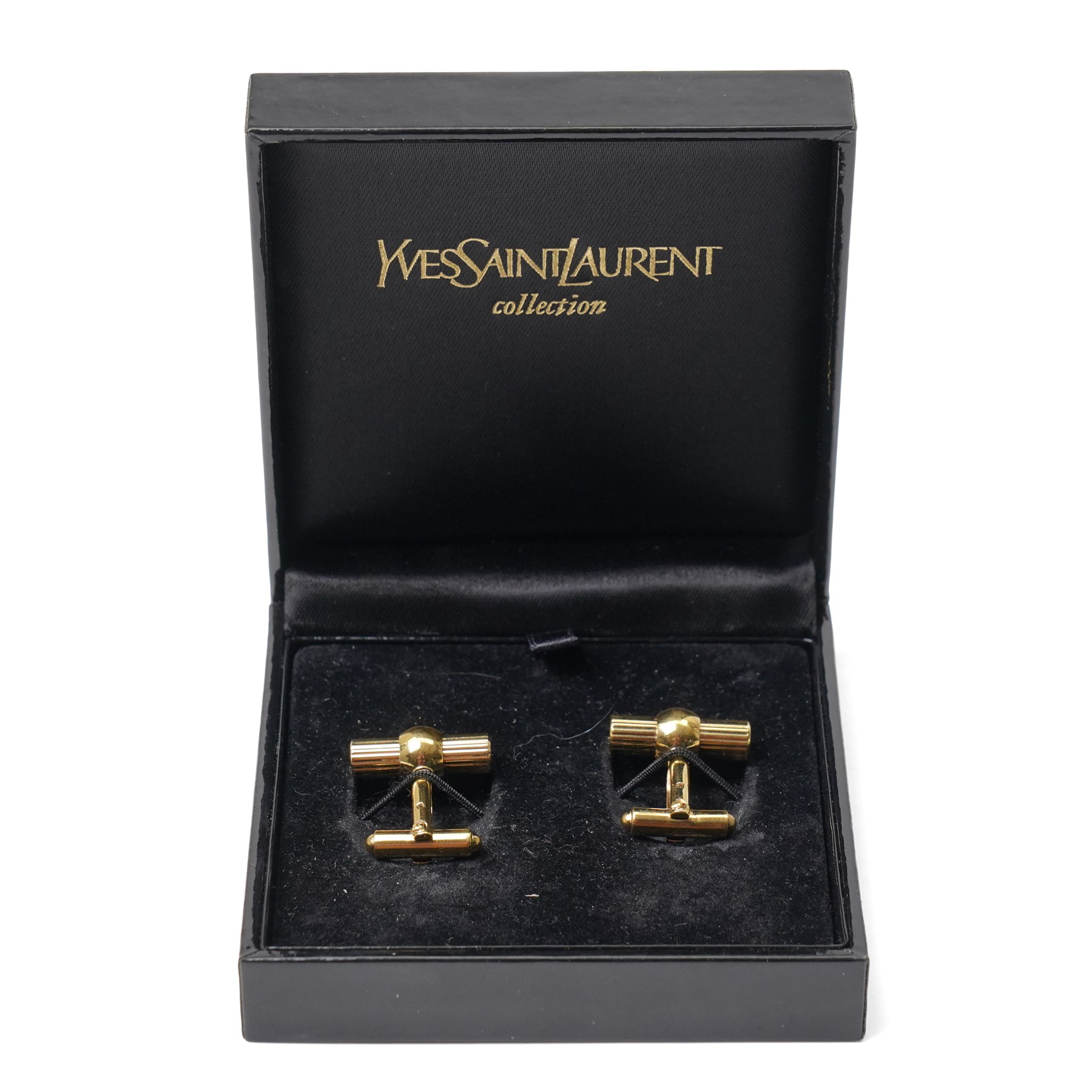 Yves Saint Laurent - pair of gold tone cufflinks, with reeded design, with original YSL box