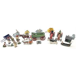 Lead figures - pre-war Charbens goat cart with girl; Timpo ploughman; Timpo cow; Salco Dray Carts; see-saw boat with boy and girl; two Charbens tractors; Taylor & Barrett governess cart; six Wendal figures etc